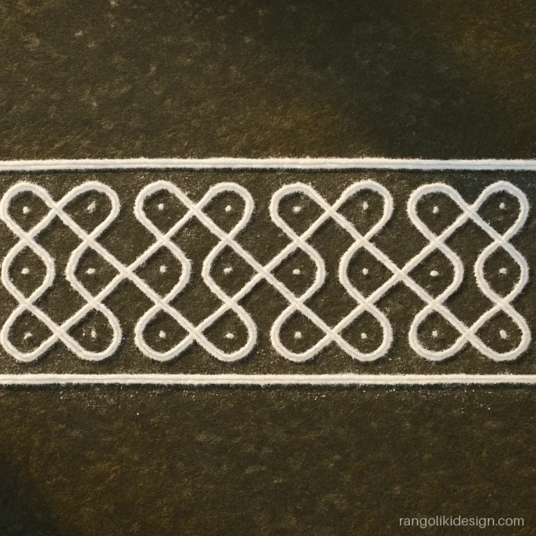Border rangoli design with dots in white kolam loops at a doorstep