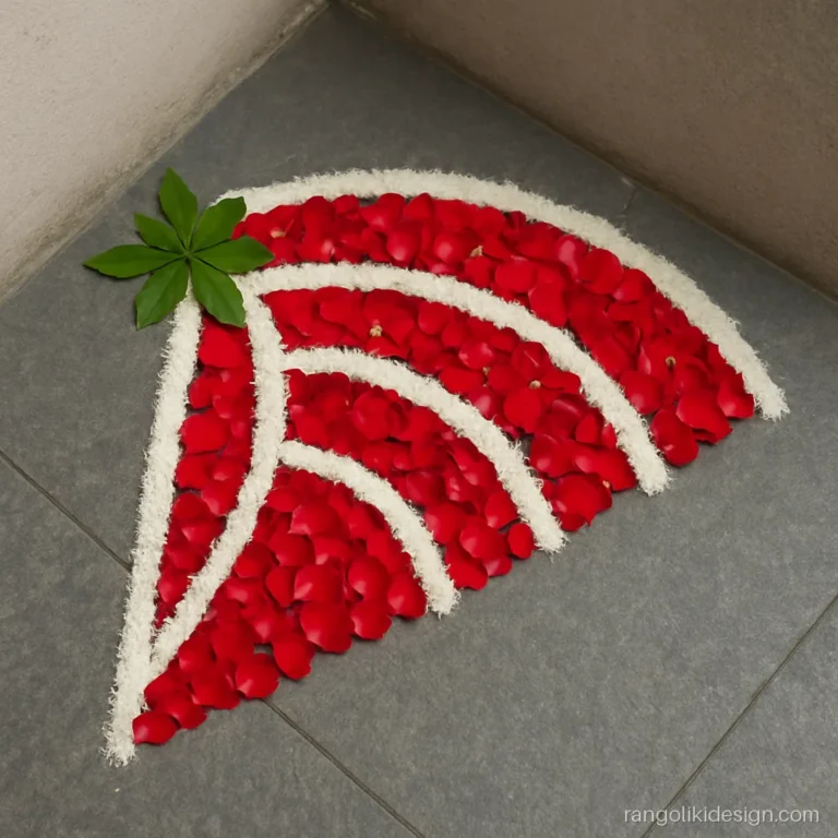 Corner rangoli with white jasmine strings and rose petals for a pooja room