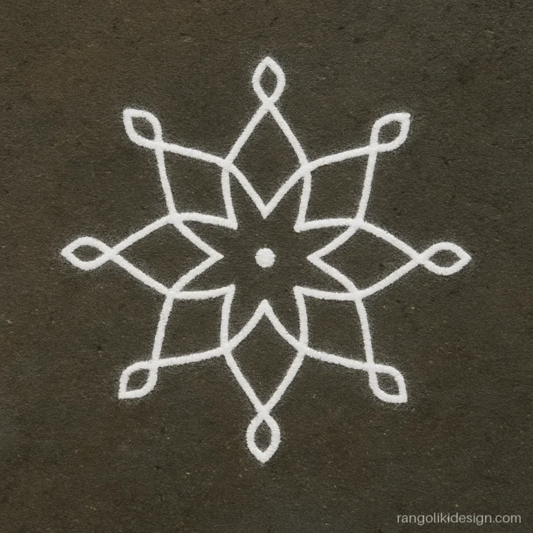 White rangoli kolam design with an eight-point star of loops on a wet doorstep